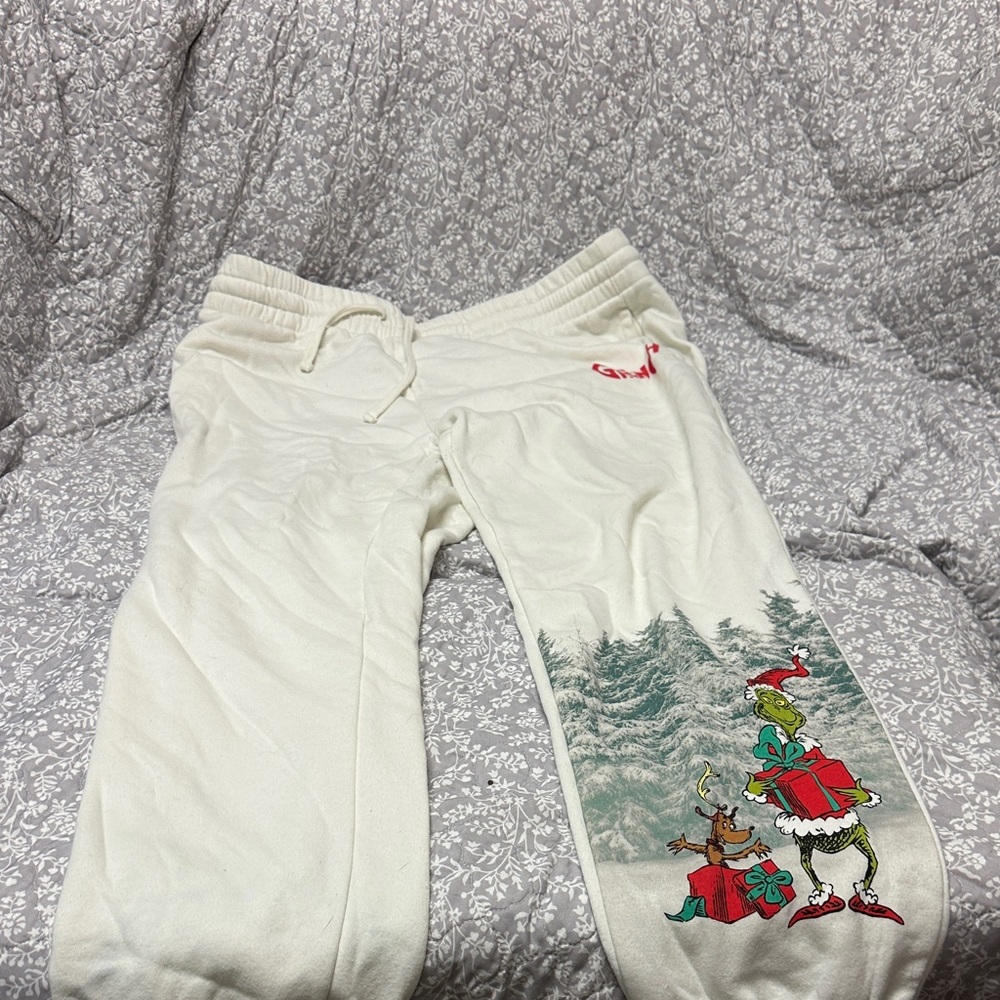 Cream Women's Grinch Holiday Pajama Pants with Gift Print